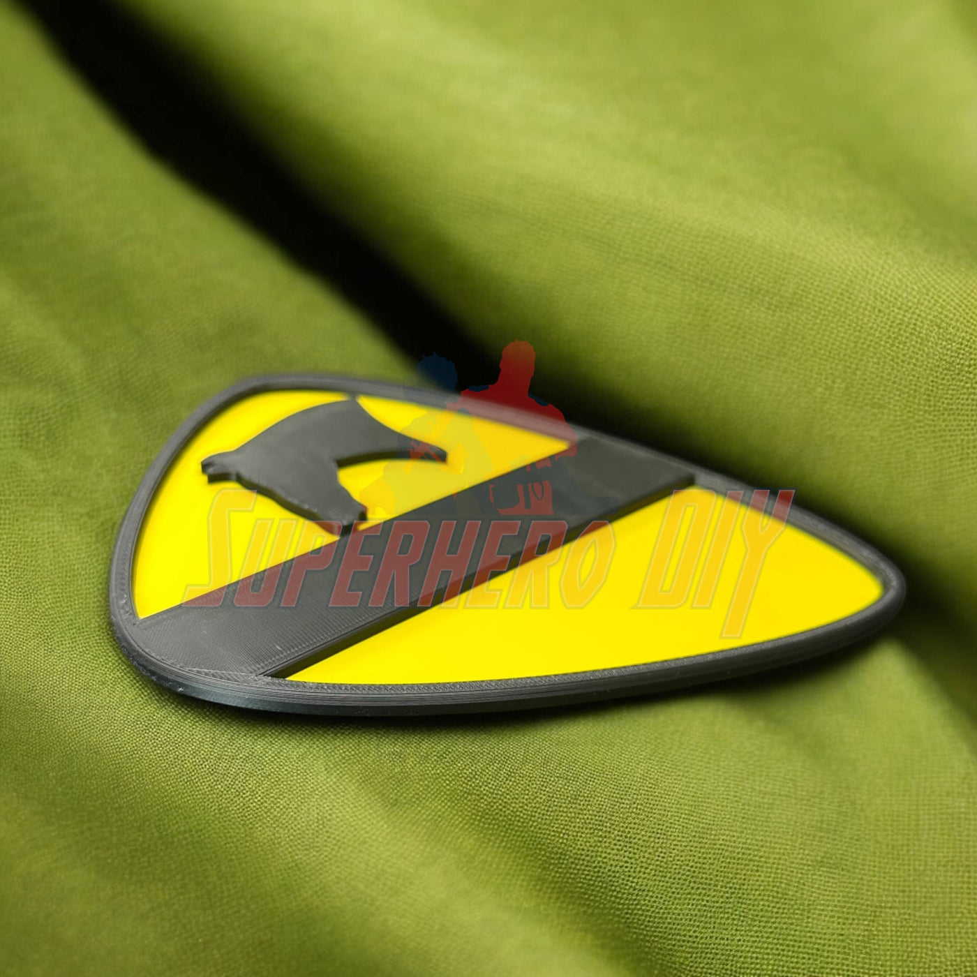 1st Cavalry Division Display Insignia on green fabric background