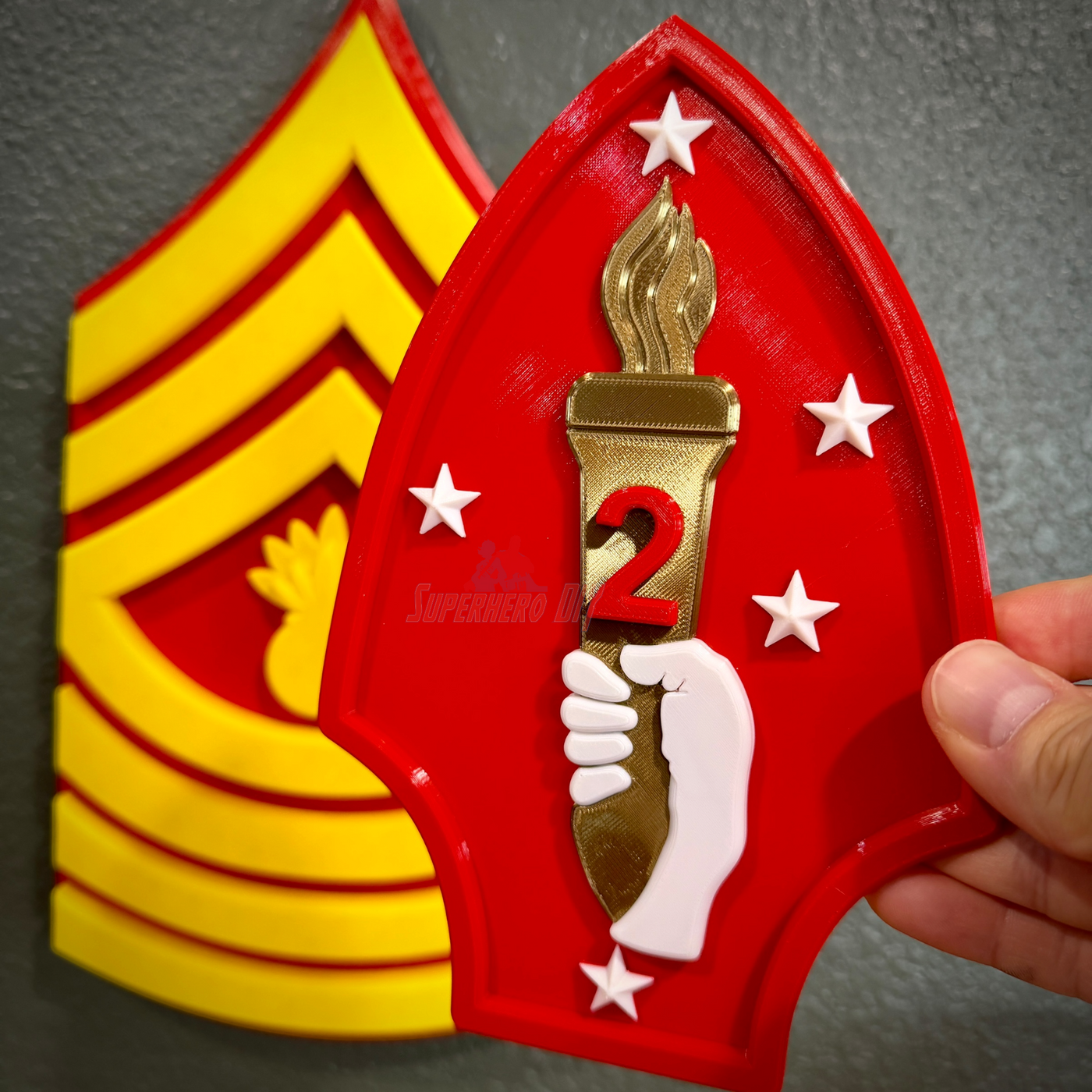 2nd Marine Division display insignia with gold torch and stars, ideal for wall decoration or display case.