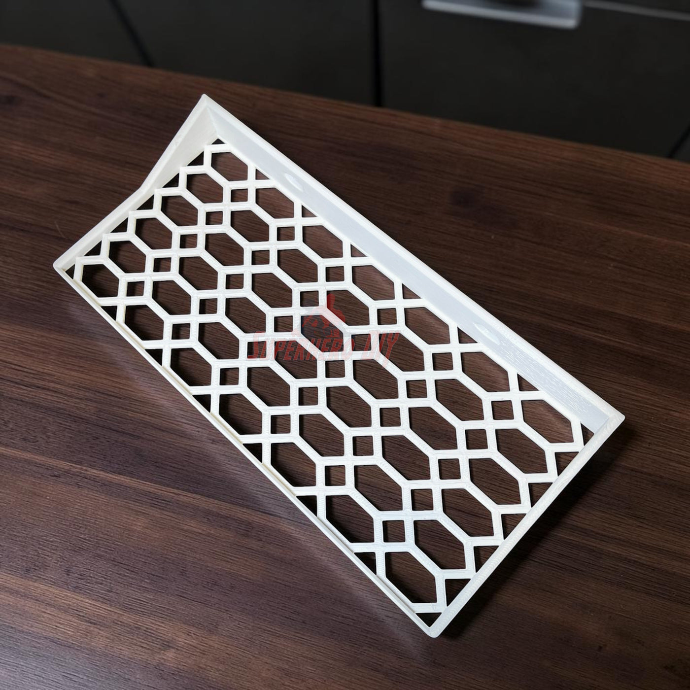 Floating shelf for Funko Pop 2-pack displaying a hex lattice design on a wooden surface.