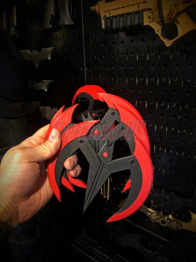 3D-printable Beyond Batarang STL file in hand, future night bat guy prop for cosplay or display, digital download for 3D printing