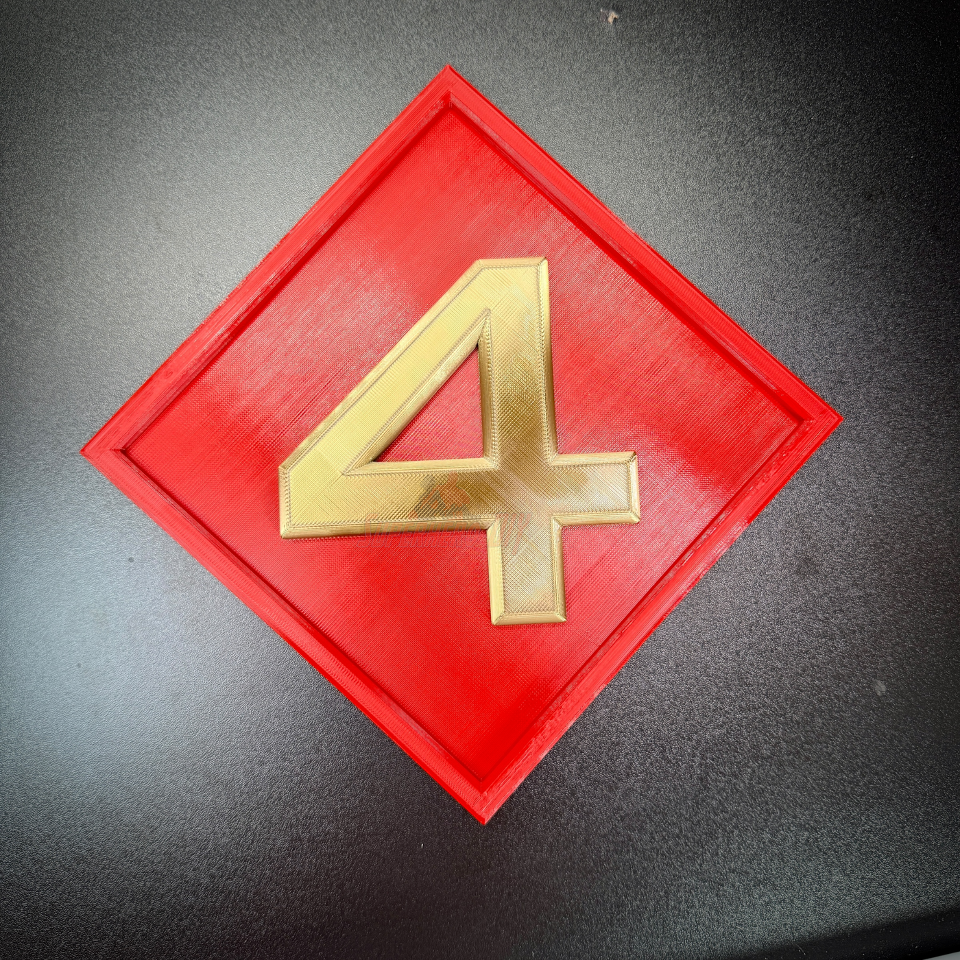 4th Marine Division display insignia with a gold numeral four on a red diamond background, perfect for wall mount.