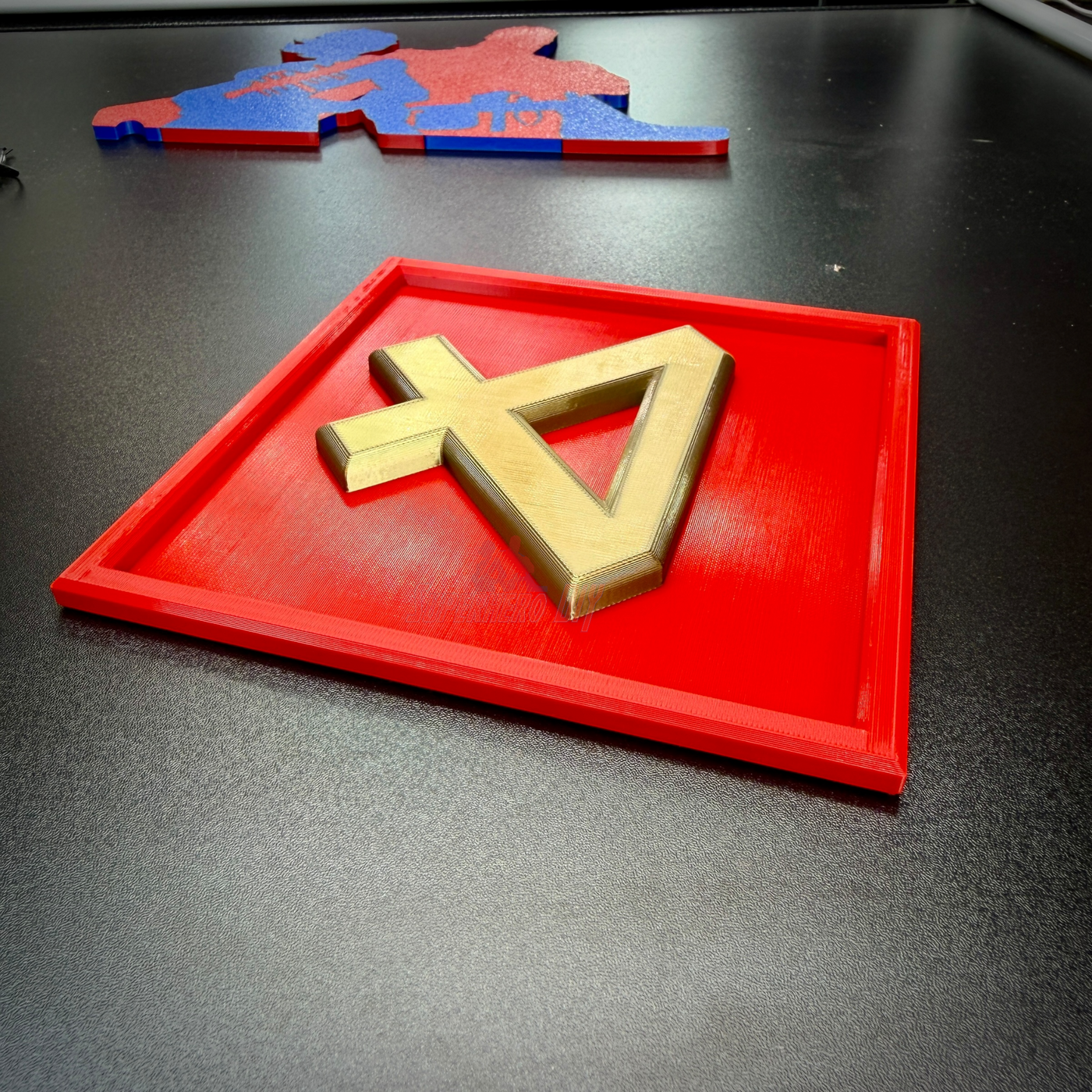 4th Marine Division insignia in layered relief on a red background, designed for display and recognition of Fighting Fourth.
