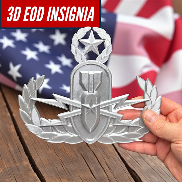 Replica EOD Badge Display held in front of an American flag