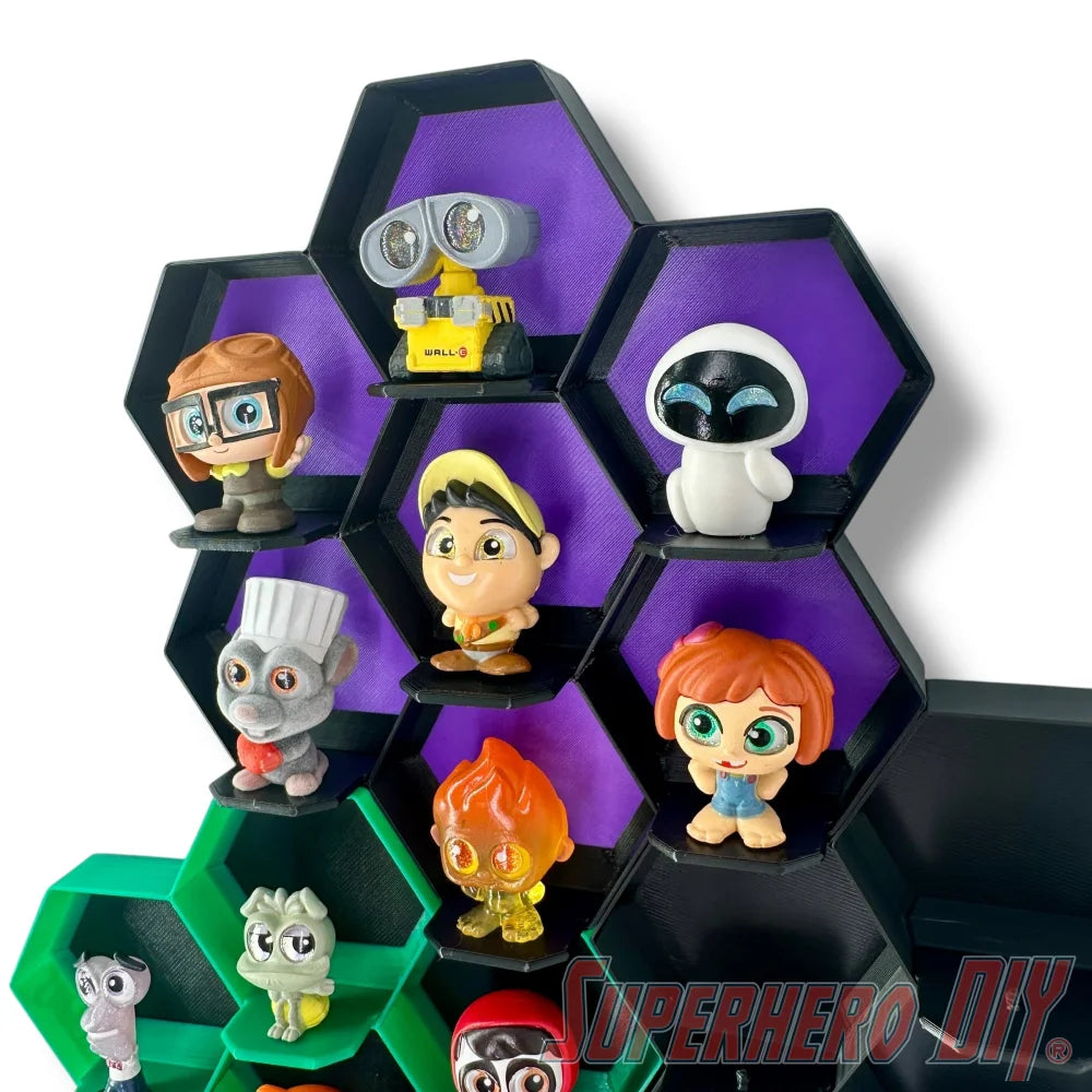 Wall-mounted honeycomb shelf for Disney Doorables, holds 7 figures with foot pegs for stable and organized display