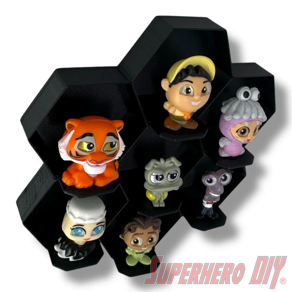 Wall-mounted honeycomb shelf for Disney Doorables, holds 7 figures with foot pegs for stable and organized display
