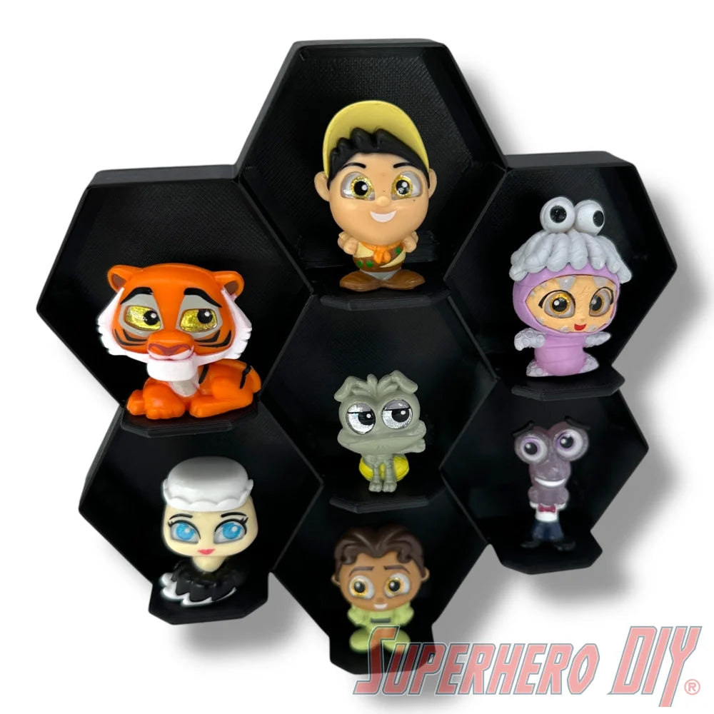 Wall-mounted honeycomb shelf for Disney Doorables, holds 7 figures with foot pegs for stable and organized display