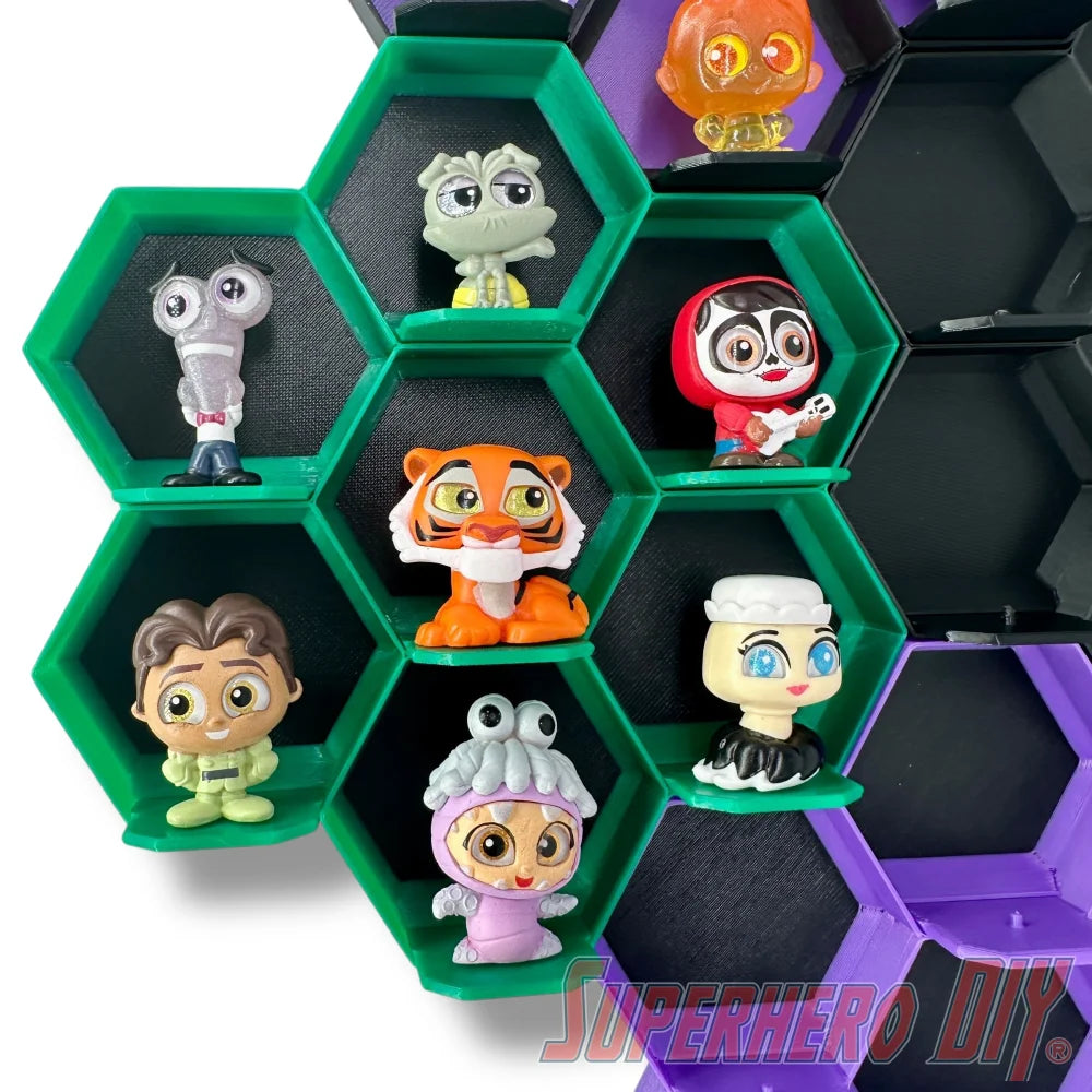 Wall-mounted honeycomb shelf for Disney Doorables, holds 7 figures with foot pegs for stable and organized display