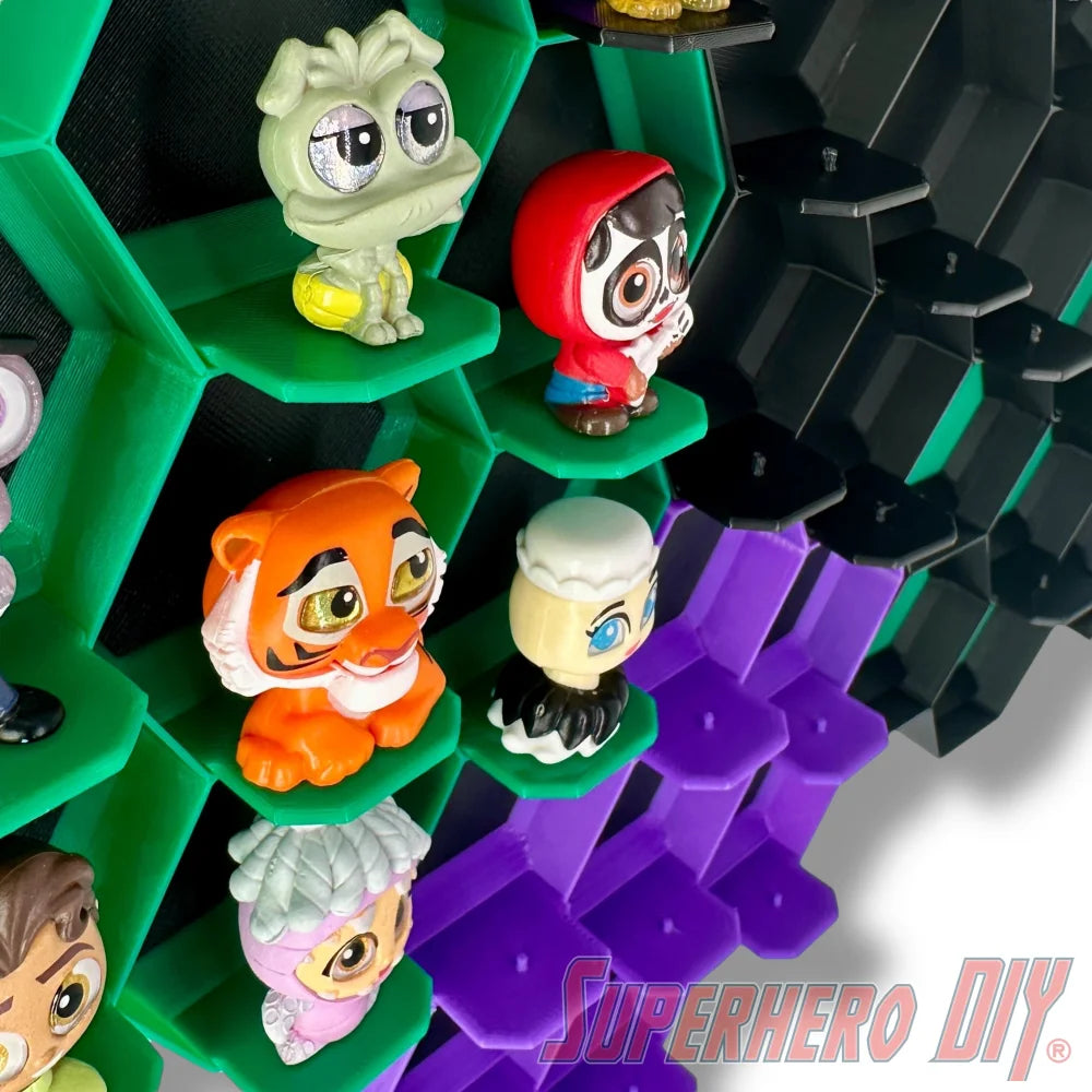 Wall-mounted honeycomb shelf for Disney Doorables, holds 7 figures with foot pegs for stable and organized display