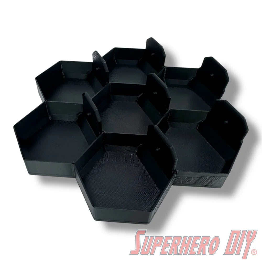 Wall-mounted honeycomb shelf for Disney Doorables, holds 7 figures with foot pegs for stable and organized display