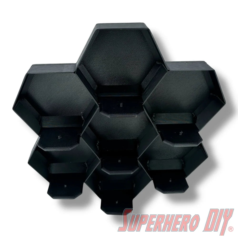 Wall-mounted honeycomb shelf for Disney Doorables, holds 7 figures with foot pegs for stable and organized display