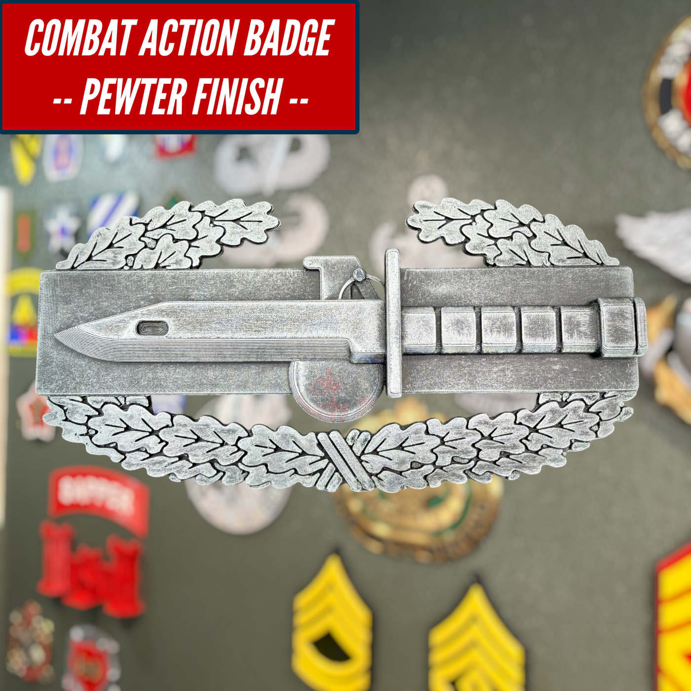 Combat Action Badge with pewter finish displayed against colorful background, showcasing intricate design.