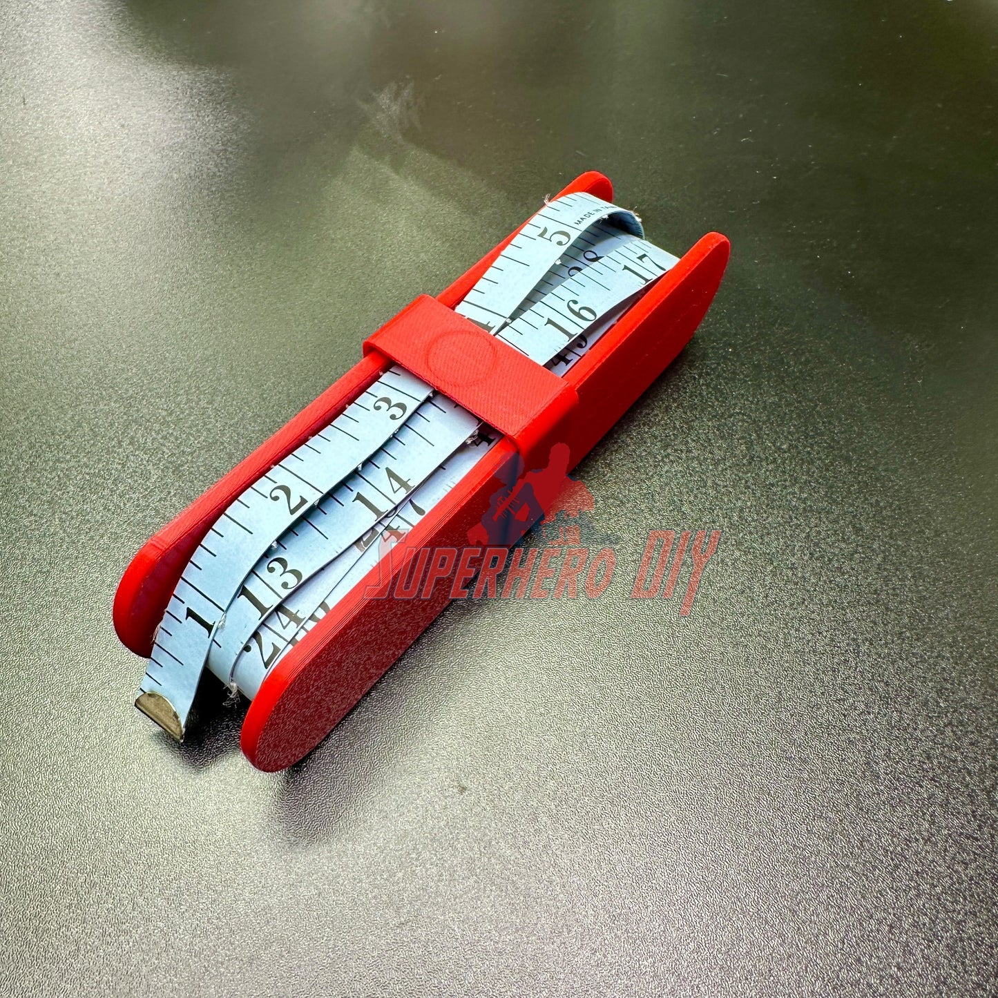 Fabric Tape Measure Holder | Snap-On Sewing Tape Storage for 60" or 145" Tailor’s Tapes | Plastic Sewing Tool for Quilters & DIY in red.