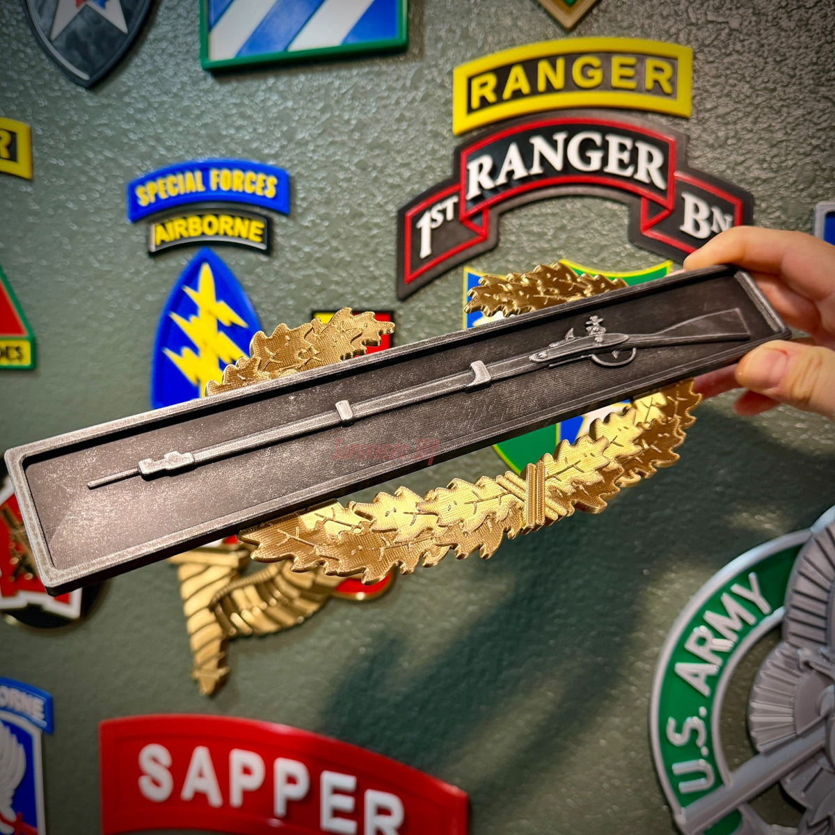 Master Combat Infantryman Badge insignia display with a flat back for adhesive wall mounting