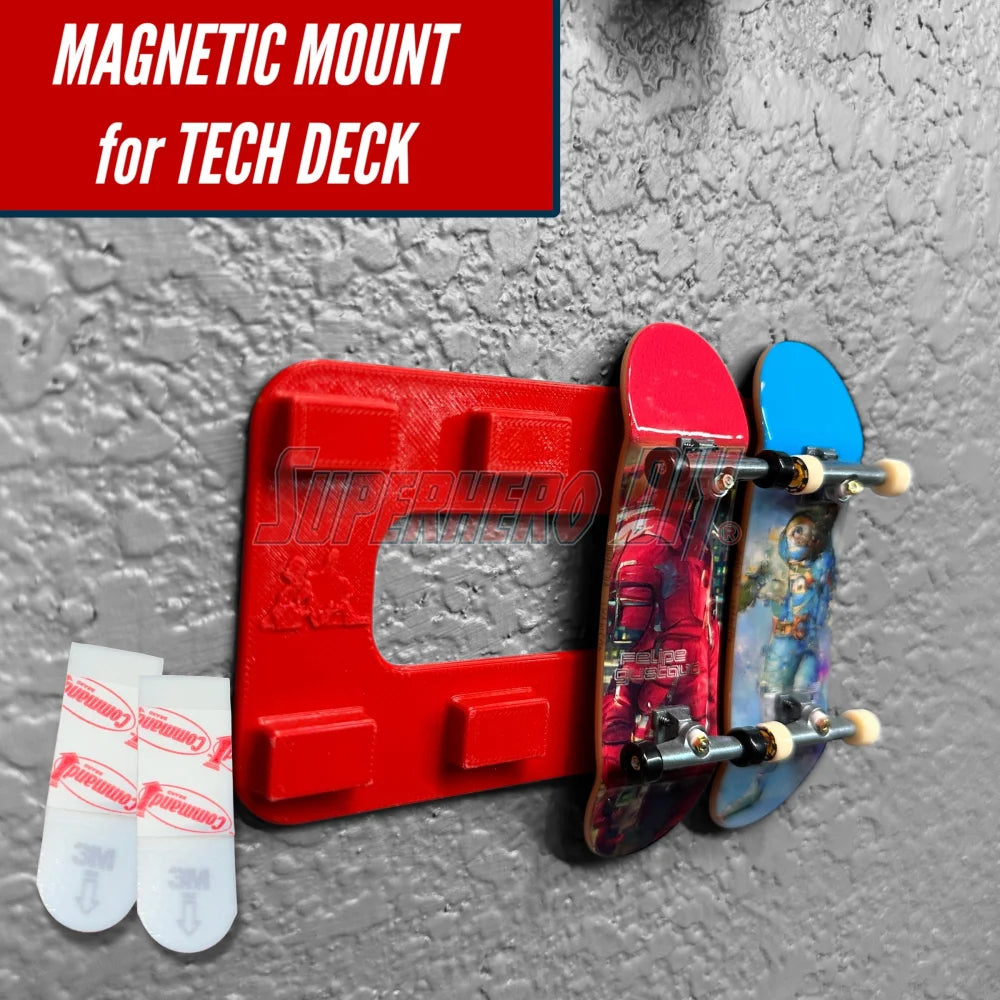 Magnetic Tech Deck wall mount displaying two fingerboards on a gray wall with adhesive strips included.