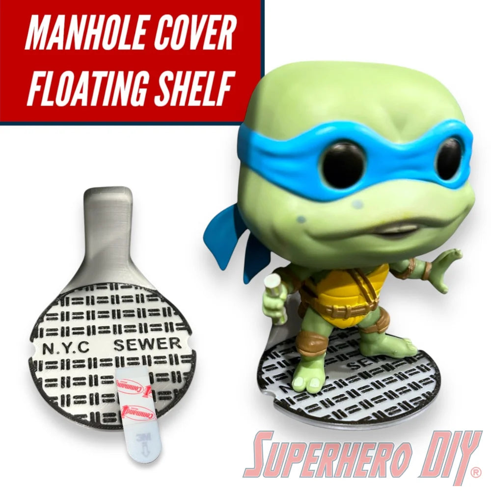 Floating shelf designed to display TMNT action figures and collectibles, styled like a sewer manhole cover for themed wall display