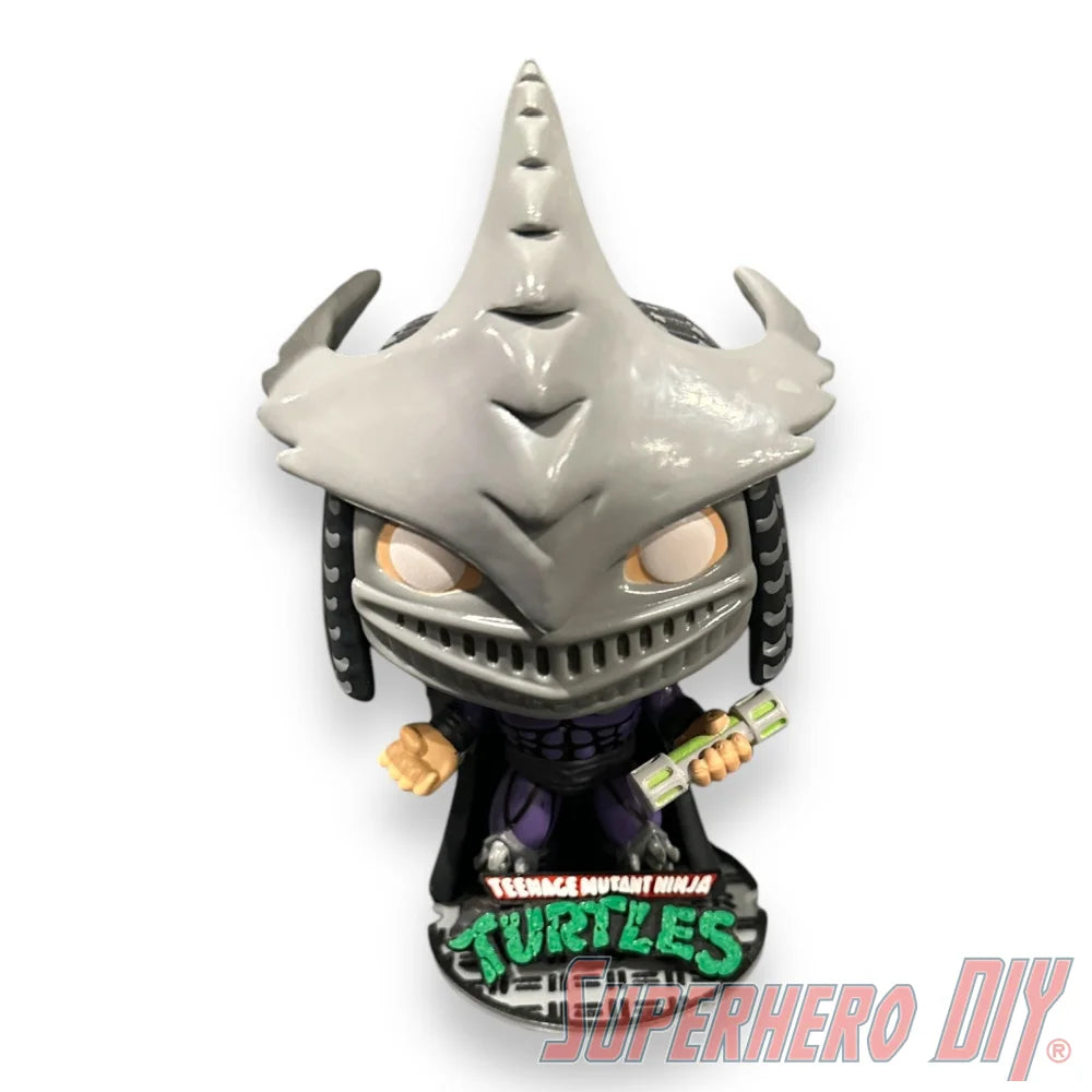 Floating shelf designed to display TMNT action figures and collectibles, styled like a sewer manhole cover for themed wall display