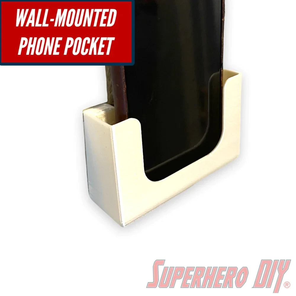 Wall-mounted phone holder with phone displayed, featuring a sleek white design, ideal for hands-free convenience in bathroom or office spaces.