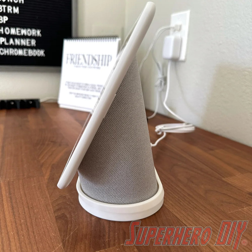 Google Nest Hub Max riser stand on a wooden counter showing angled position for protection from splashes.