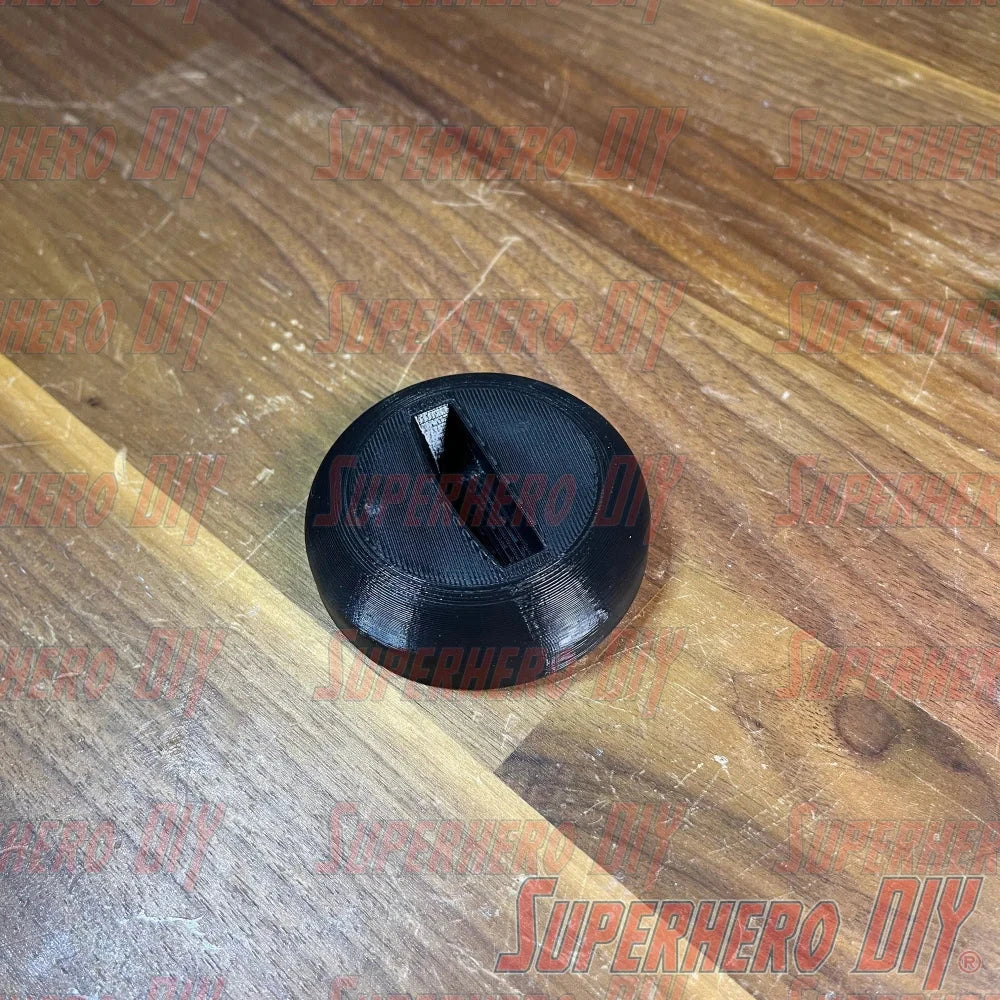 Apple TV Remote Stand 3D-printed holder for keeping your Siri Remote organized and accessible on wooden surface.