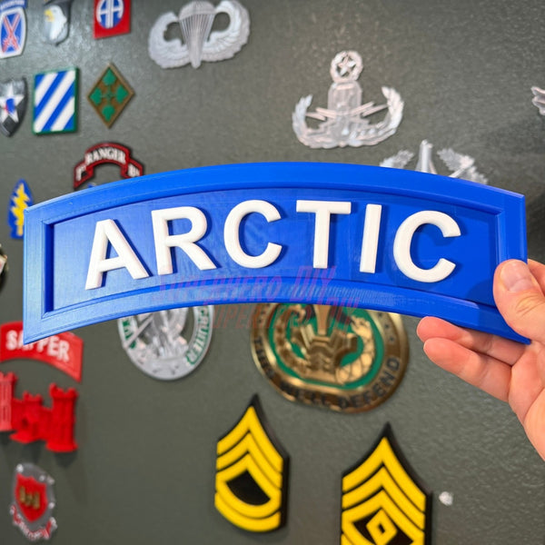 3D Arctic Tab display piece in blue with white lettering, ideal for shadow boxes or wall mounts.