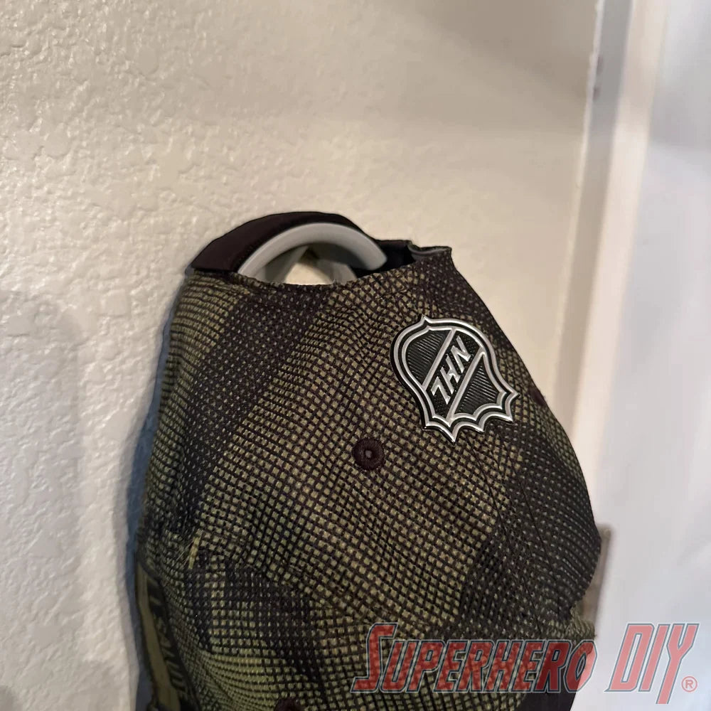 Hat Display Wall Mount | Hang your caps with ease using these wall hooks! - Superhero DIY