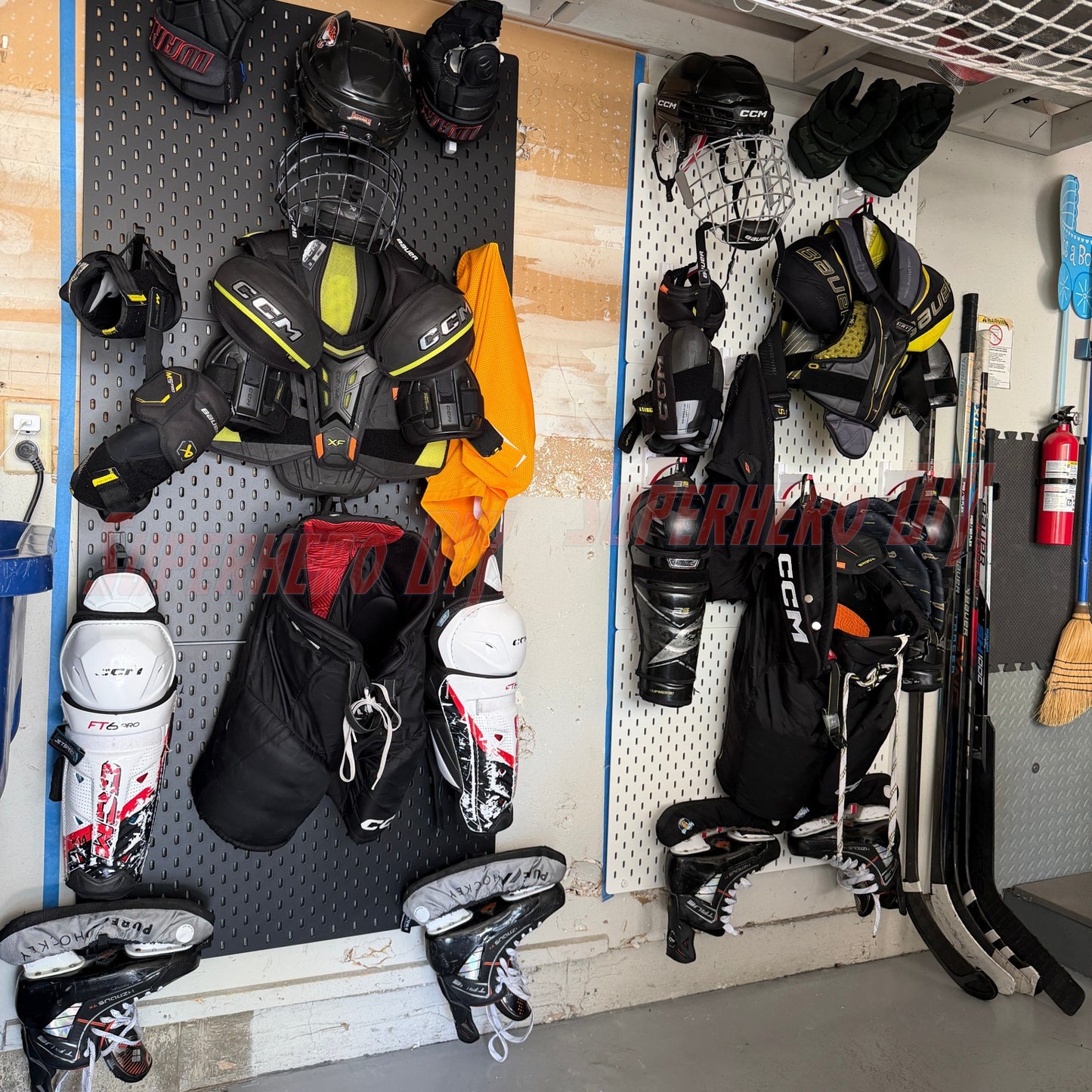 Wall-mounted hockey gear organizer displaying organized equipment in garage setting.