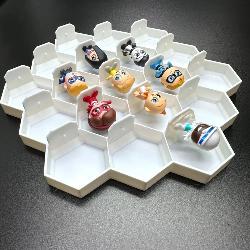 Honeycomb display for 19 Disney Doorables showcasing collectible figures in a 3D-printed hexagonal organizer.