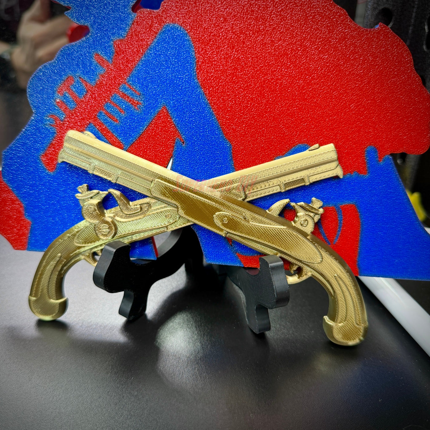 Army military police insignia displayed with crossed gold pistols against a colorful backdrop.