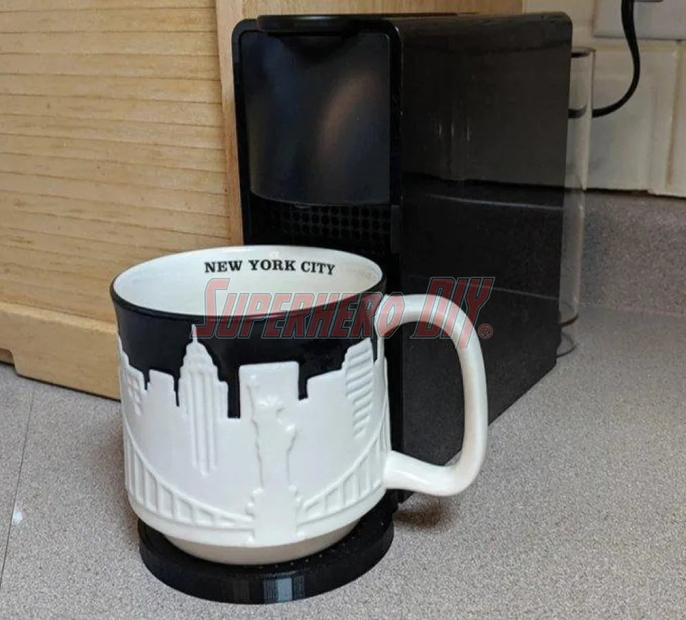 Mini mug drip tray Nespresso Essenza with New York City mug on coffee maker