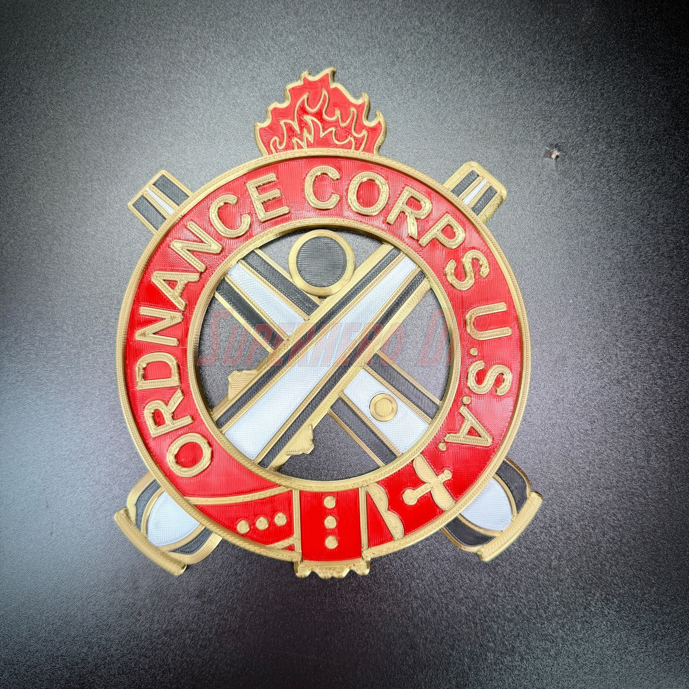 Ordnance Regimental Crest with red and gold detailing for display in shadow box or wall.