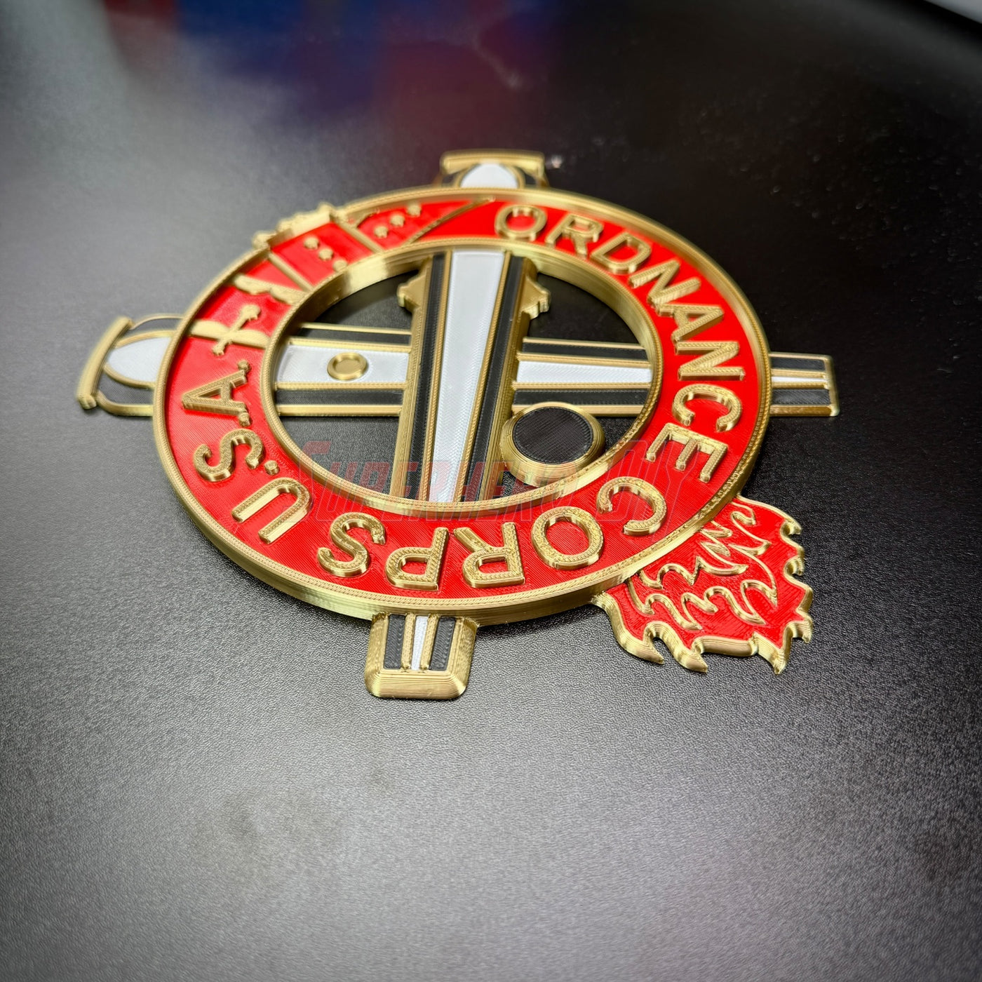 Ordnance Regimental Crest in red and gold, showcasing a detailed design for wall display.