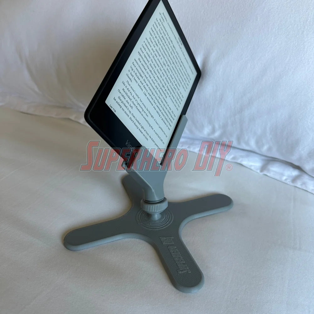 3D-printed side-reading stand for Kindle Paperwhite, made for hands-free reading in bed while lying on your side