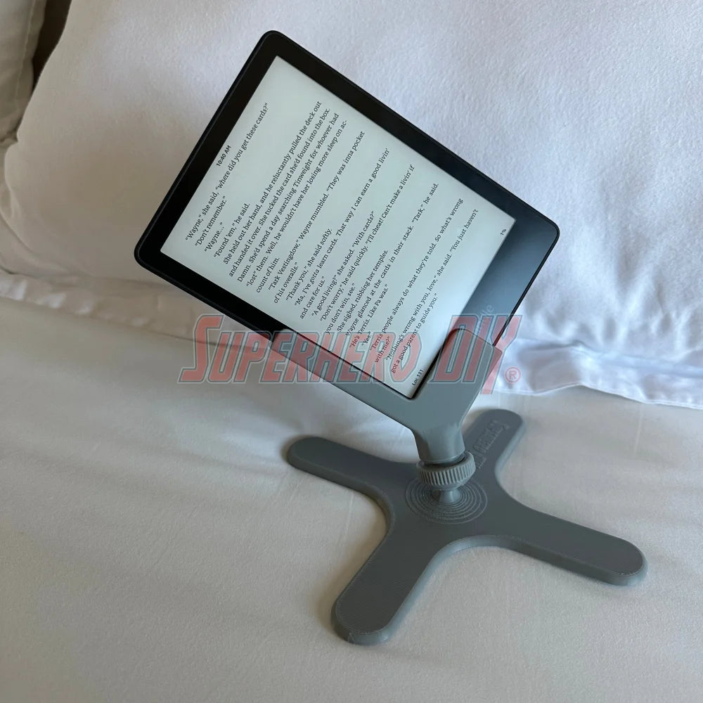 3D-printed side-reading stand for Kindle Paperwhite, made for hands-free reading in bed while lying on your side