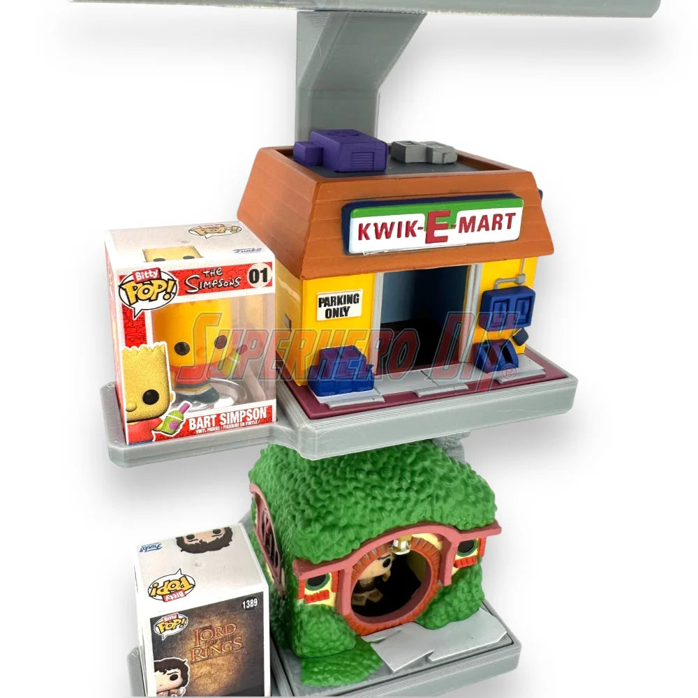 Stackable floating shelf for Bitty Pop Towns sets, designed to hold Funko figures and town box in a vertical wall-mounted display