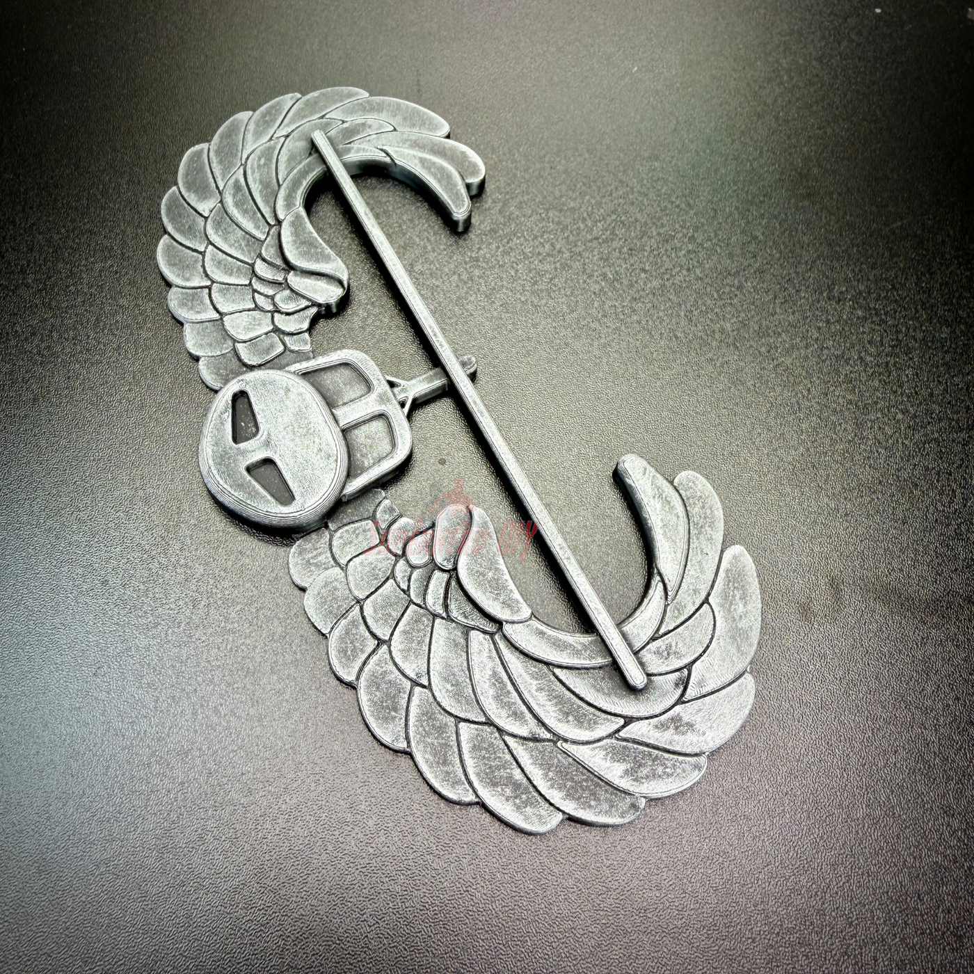 Subdued air assault badge display insignia with wings, perfect for military wall mounts or shadow box displays.