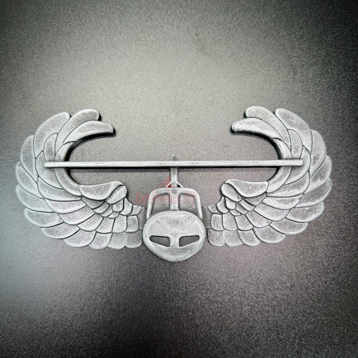 Subdued Air Assault Badge display insignia, detailed design with wings, perfect for wall mount or shadow box.