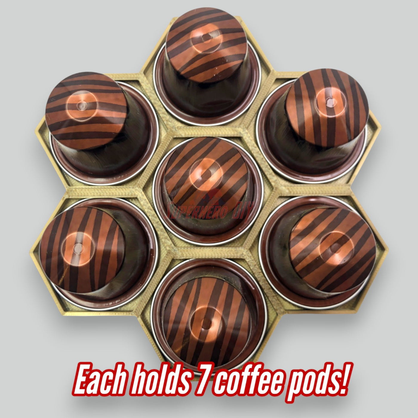 Original Nespresso coffee pod organizer holding 7 capsules per hex piece, showcasing modular design.