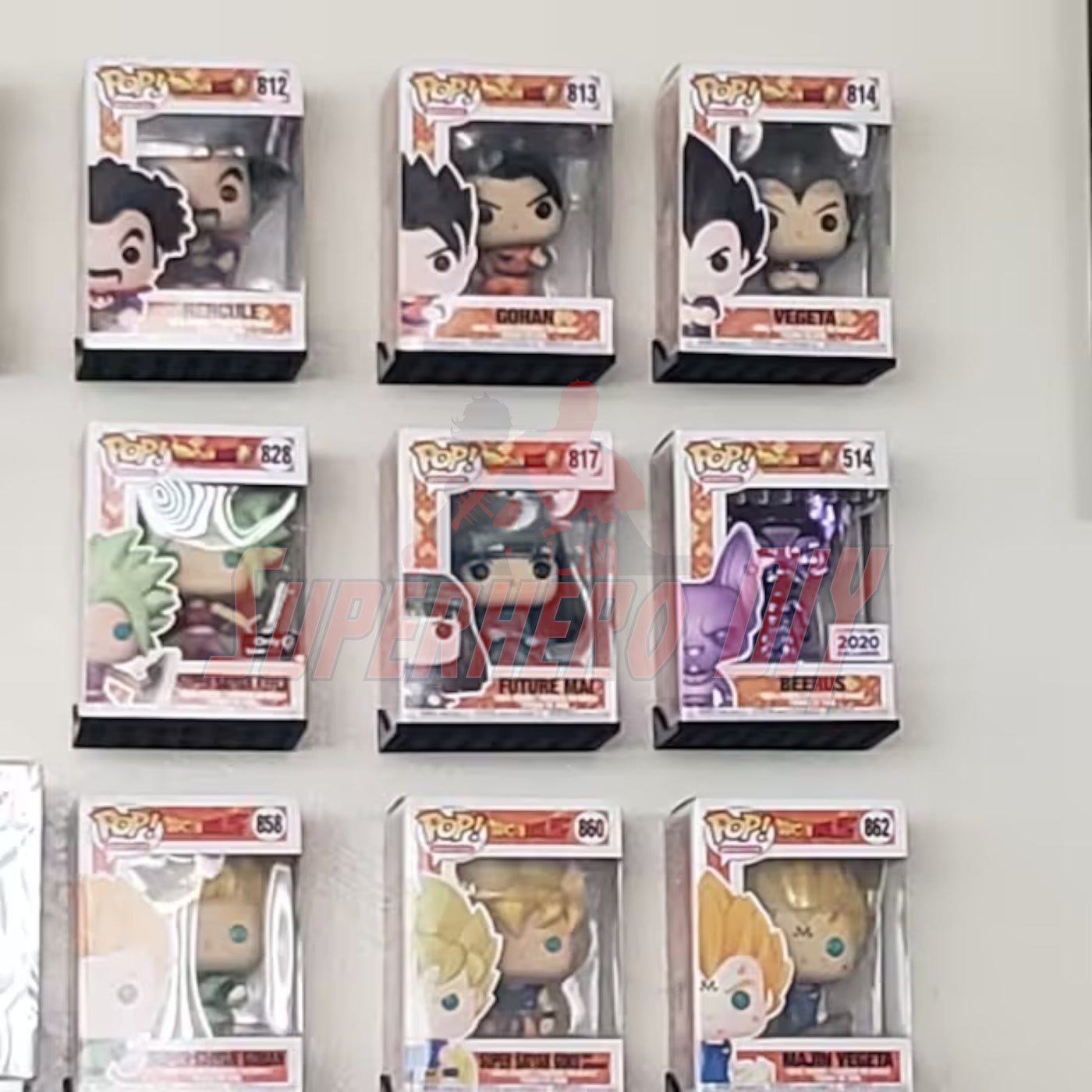 Hexagon Funko Pop display shelves showcasing boxed figures on a wall-mounted shelf.