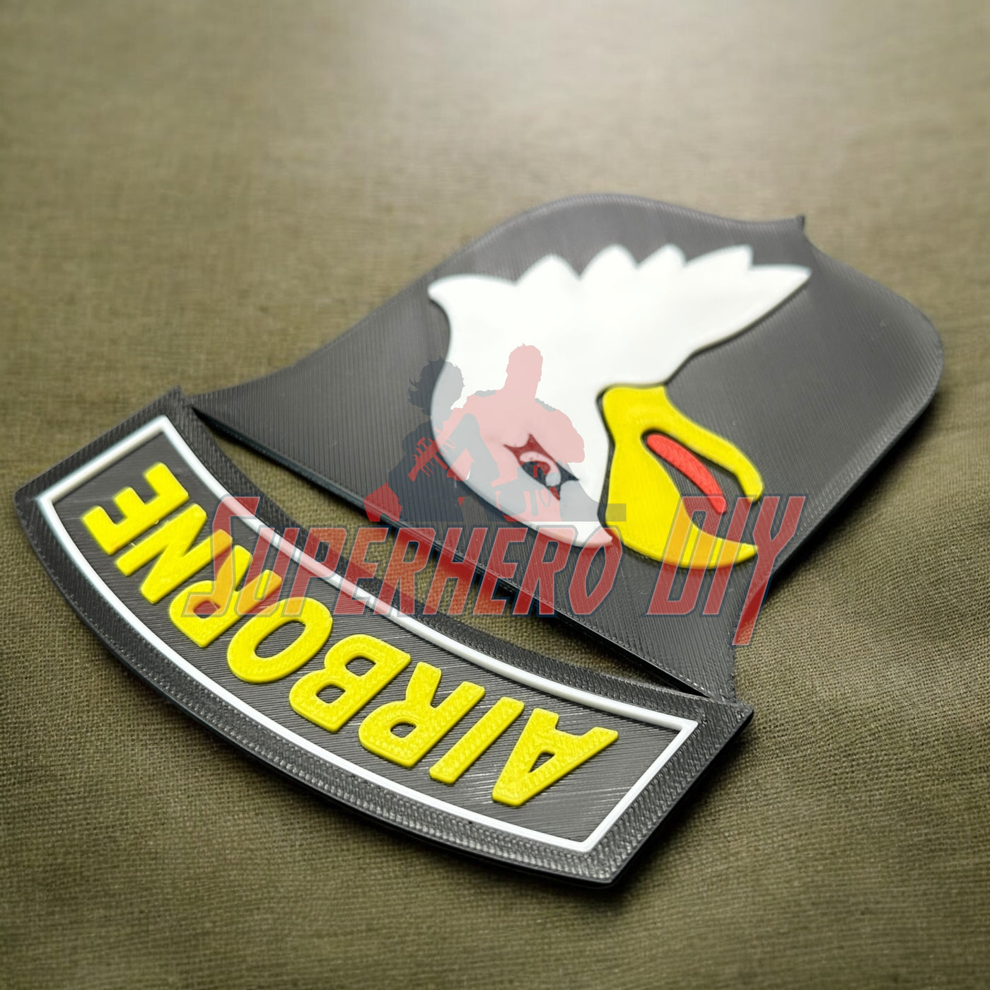 101st Airborne Division display insignia in 3D print on khaki fabric background, perfect for honoring decorated U.S. Army unit.