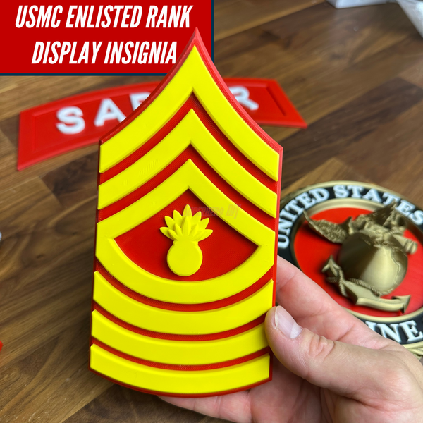USMC enlisted rank display insignia featuring a yellow and red design, honoring the U.S. Marine Corps enlisted ranks.