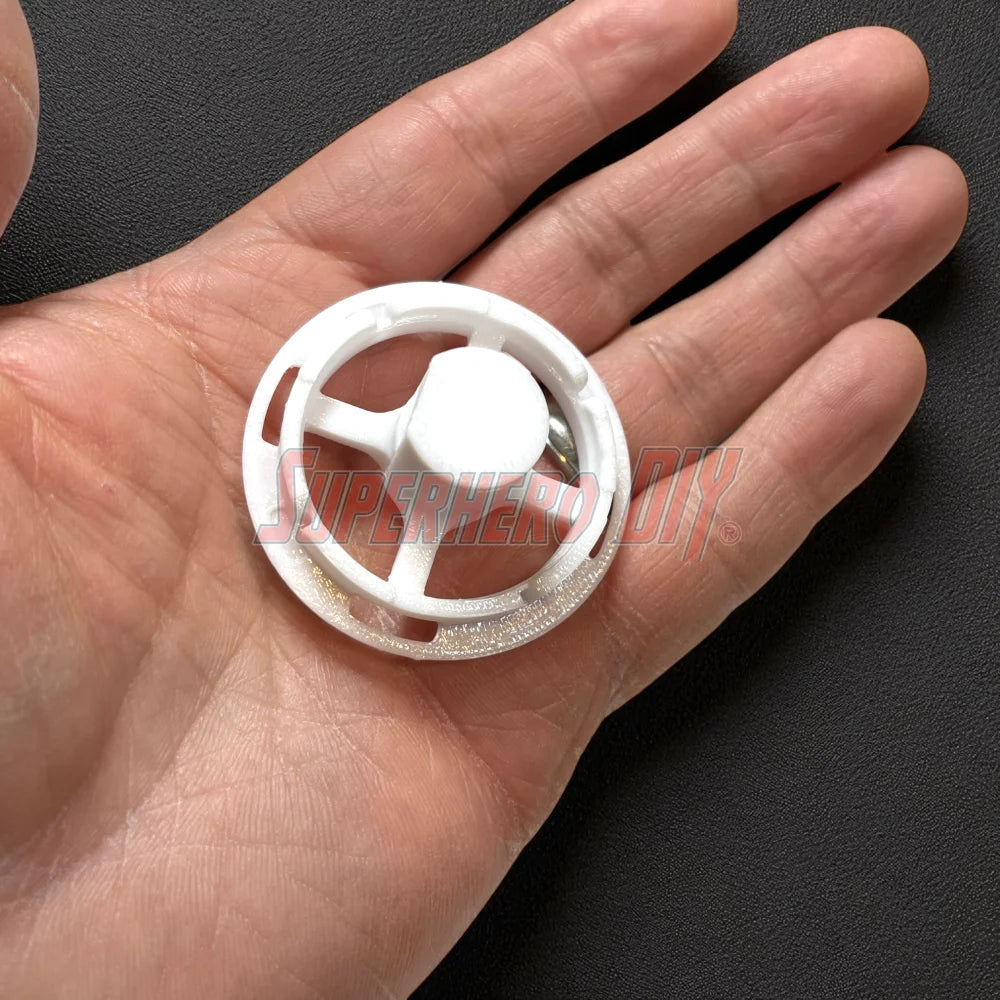 Top view of 3D-printed replacement mount for Toyota Highlander temperature control knob, showing D-shaped slot for metal sleeve