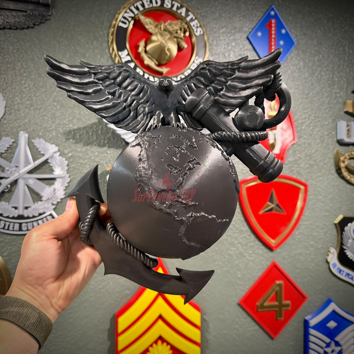 USMC Eagle, Globe, and Anchor insignia wall display, eagle with wings spread over the globe