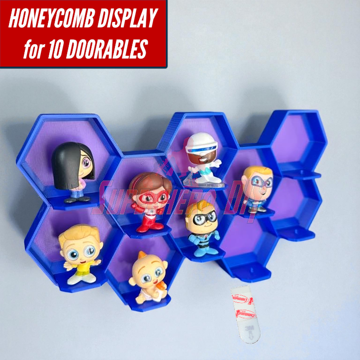 10-Cell honeycomb display for Disney Doorables with figures mounted on wall in hexagonal cells