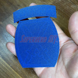 3D-printed 10th Mountain Division insignia in blue held in hand, showcasing clean design and bold lettering.
