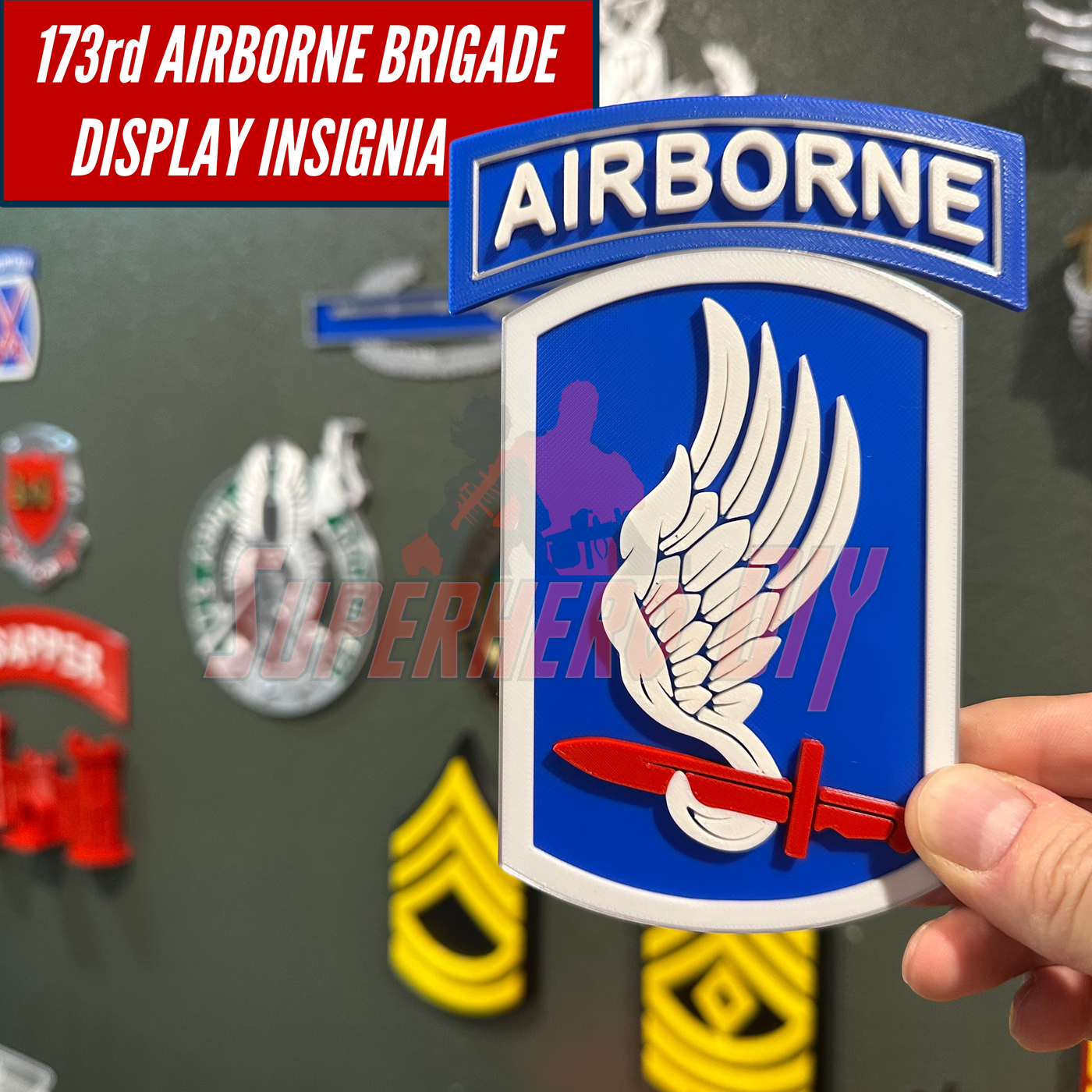 173rd Airborne Brigade display insignia featuring a winged design with a red sword, perfect for unit pride.