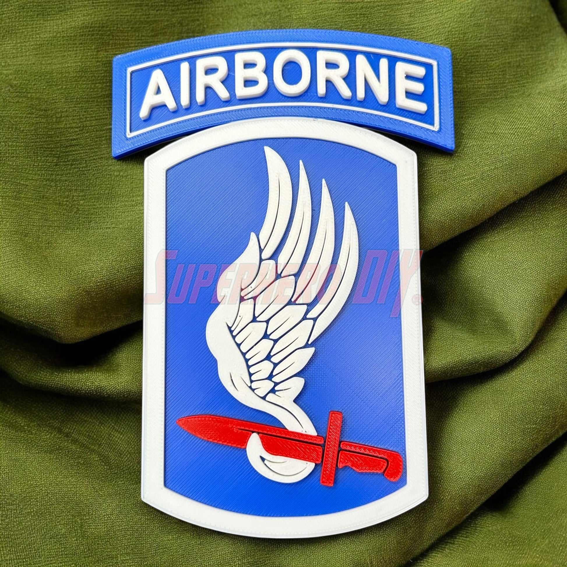 173rd Airborne Brigade display insignia featuring a winged design and a sword, perfect for unit pride.