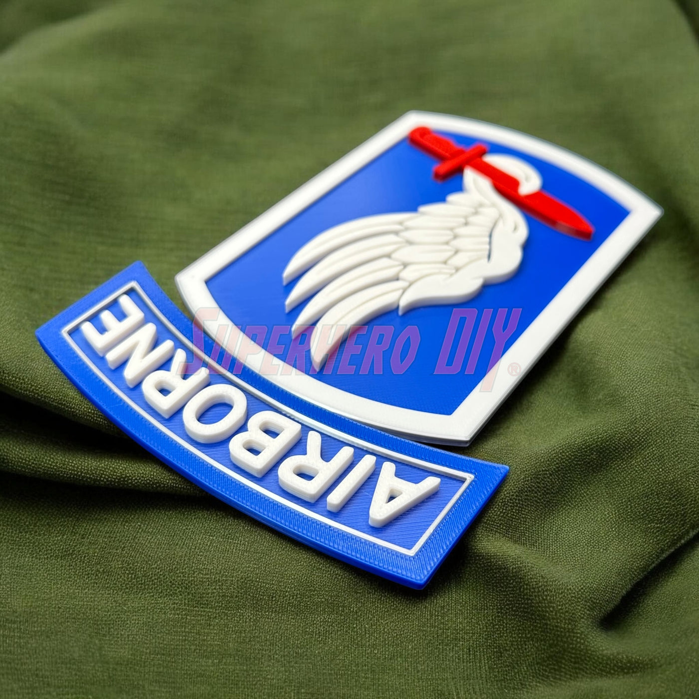 173rd Airborne Brigade display insignia on green fabric background, featuring Sky Soldiers emblem.