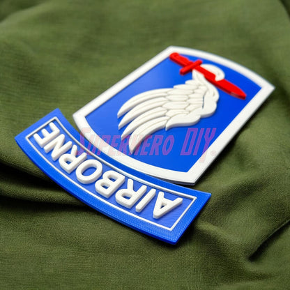 173rd Airborne Brigade display insignia on green fabric background, featuring Sky Soldiers emblem.