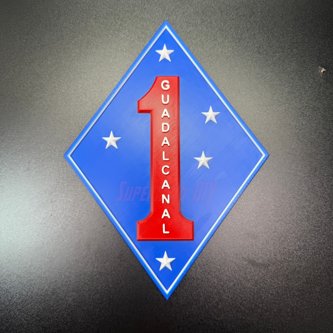 1st Marine Division Display Insignia featuring Guadalcanal with blue diamond and red numeral one