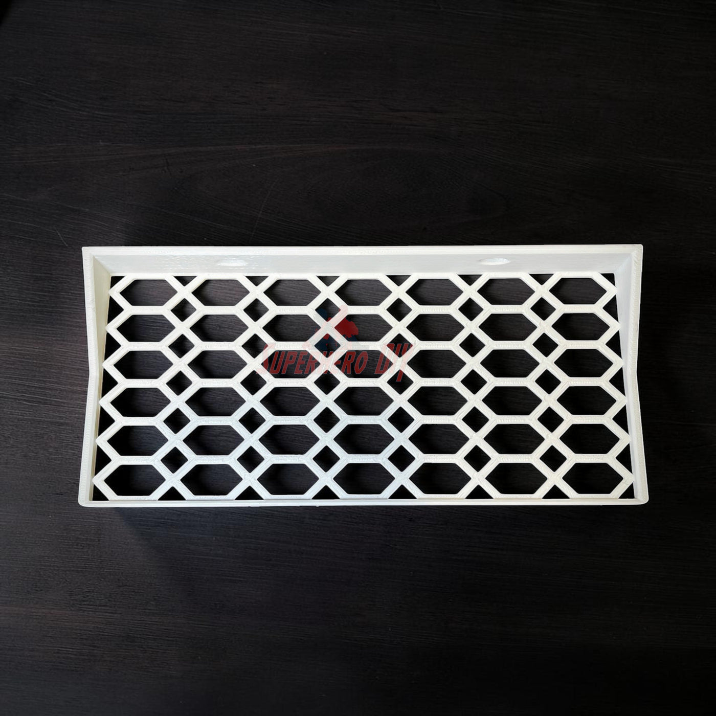 Floating shelf for Funko Pop 2-pack with hexagonal lattice design for displaying collectibles.